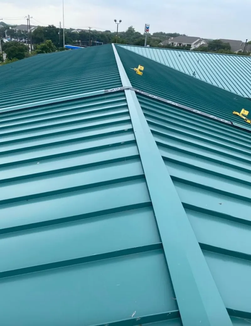 Green commercial metal roof ridge and valley for Metal Roof Repair in Locust Grove